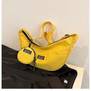 Yellow canvas dumpling crossbody bag with small round pouch, casual shoulder bag for women.
