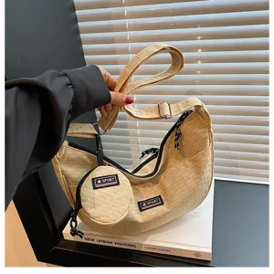 Canvas crescent crossbody bag, casual daily shoulder handbag with coin purse detail.