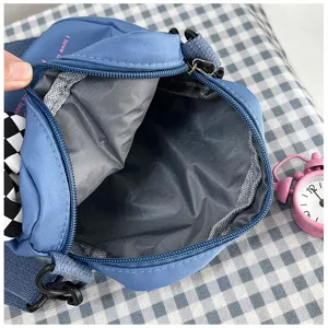 Blue canvas shoulder crossbody bag for students, casual fashion large capacity handbag.