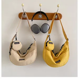 Canvas crescent shoulder bag detail, casual daily commuter crossbody bag with small pouch.