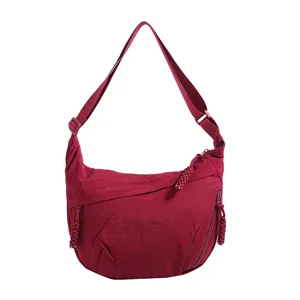 Casual nylon cross-body shoulder bag, simple dumpling design, large capacity for daily use.