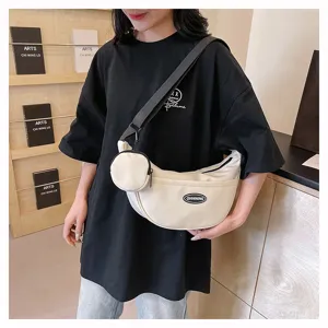 Casual canvas crescent shoulder bag for women and men, minimalist daily crossbody bag with pouch.