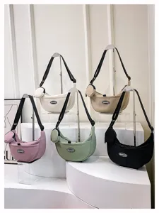 Casual nylon crescent crossbody bag, minimalist dumpling shoulder bag for daily commuting.