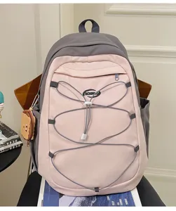 Trendy casual dual-color school backpack with elastic front cords and large capacity storage.