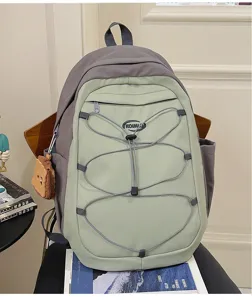 Stylish colorblock backpack with elastic cord and cute pendant for daily casual use.