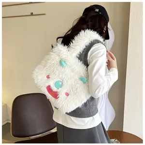 Cute fluffy monster plush shoulder bag for women, soft white fuzzy tote bag with cute design.