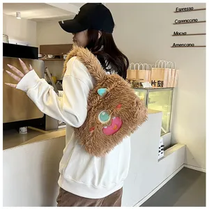 Cute fluffy little monster shoulder bag, soft plush material with funny cartoon face detail.
