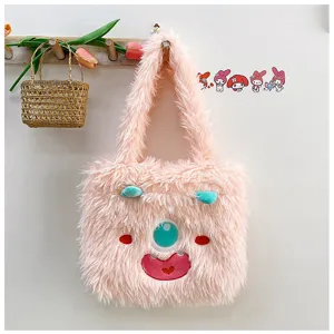 Pink fluffy monster tote bag, cute plush shoulder bag with big eyes and soft texture.