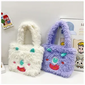 Cute fluffy monster shoulder bag detail showcasing soft plush texture and funny face embroidery.
