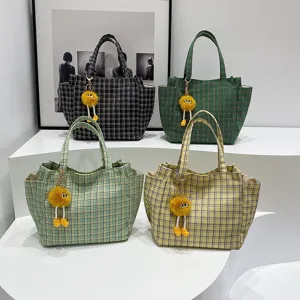 Stylish plaid knit tote bag with cute plush keychain, large capacity shoulder bag for women.