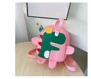 Kids cute dinosaur backpack detail view, pink toddler school bag with lovely crown design.