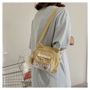 Cute nylon crossbody bag with bear ears design, ideal for daily casual wear and school.