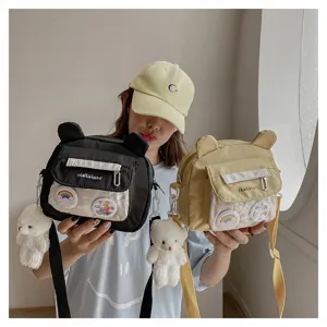 Cute bear ear nylon crossbody bag with plush pendant, sweet student casual messenger bag.