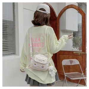 Cute nylon crossbody bag for women, sweet bear ear design with plush pendant, student daily shoulder bag.