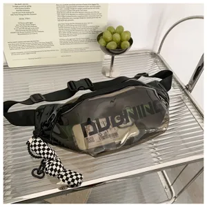 Transparent black PVC chest bag detail view, fashion streetwear sling waist bag with checkered charm.