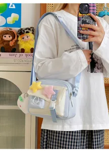 Cute casual canvas messenger bag featuring plush star decorations and adjustable strap.