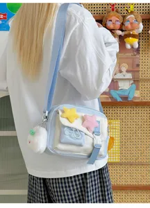 Cute canvas crossbody bag detail shot with plush star decor and bunny keychain for daily use