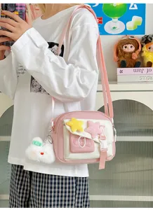 Cute pink white crossbody bag casual canvas shoulder bag with plush stars and sweet style.