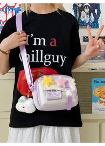 Detailed view of the cute purple and white canvas crossbody bag with plush star charms.
