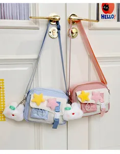 Cute canvas crossbody bag with plush star and bunny charm for teen girls and students.