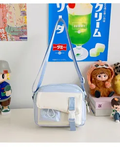 Light blue canvas crossbody bag cute casual student shoulder bag for daily outdoor use.