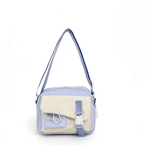 Casual canvas crossbody bag for women, stylish contrast color shoulder bag for daily use.