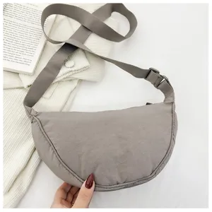 Grey crescent shoulder bag casual dumpling crossbody bag for women daily casual use.