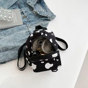 Modischer Cord-Minirucksack mit Kuhmuster, trendiger lässiger Damen-Tagesrucksack für den Alltag.