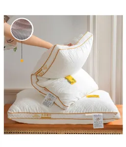 Soybean fiber pillow detail view, soft and comfortable white filling with golden piping.