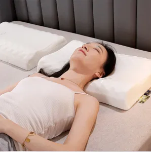 Oreiller ergonomique en mousse à mémoire de forme détail montrant le soutien du cou et sommeil.