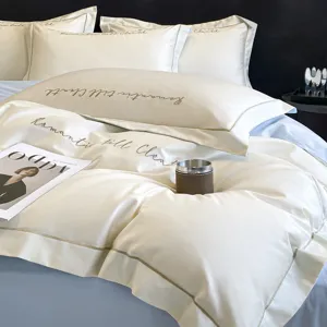 Juego de ropa de cama de algodón bordado de lujo con funda nórdica para dormitorio elegante.