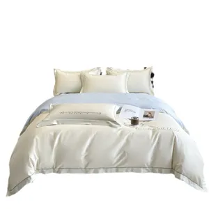 Lujoso juego de ropa de cama de algodón bordado de alta densidad para dormitorio elegante.