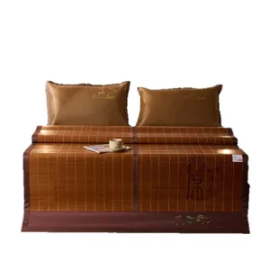 Foldable bamboo cooling mat summer bed set with two matching pillowcases for home dorm use.