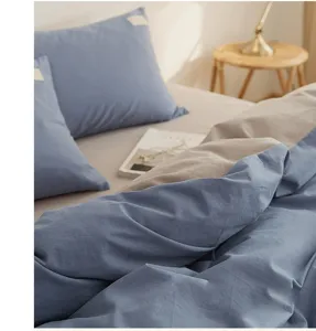 Cozy soft pure cotton bedding detail view, stylish blue and khaki duvet cover set.