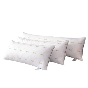 White quilted long pillows with love heart print and black piping for couples and double beds.
