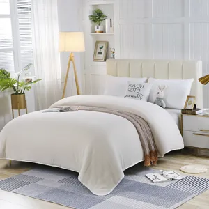 Couette d'hiver épaisse en pur coton pour literie de chambre confortable et douillette.