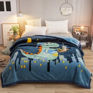 Soft winter Raschel fleece blanket detail featuring a cute cartoon dinosaur city skyline design.