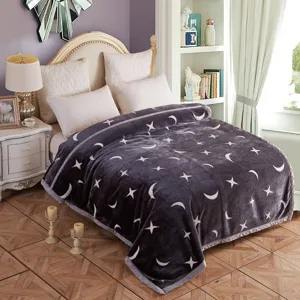 Cozy winter Raschel velvet blanket featuring elegant star and moon prints for warm bedroom decor.