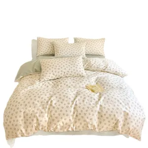 Cozy cotton floral bedding set with duvet cover and pillowcases for student dormitory.