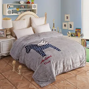 Grey plush winter blanket with winged horse pattern, soft warm bed cover for home use.