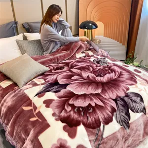 Winter thick Raschel plush blanket with large floral print, warm and cozy home bedding throw.
