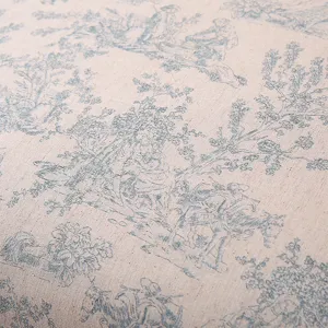 Close up detail shot of cotton linen fabric featuring classic blue pastoral print.