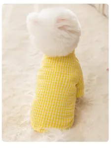 Cute yellow checkered pet winter warm two-leg cotton coat for dogs and cats, cozy fashion apparel.