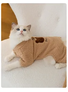 Detail shot of cute cat winter warm fleece pet clothes with adorable bear embroidery design.