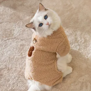Cute warm pet fleece clothes with cute bear patch and leash ring for cats and dogs in winter.