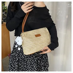 Summer woven straw handbag for women, stylish shoulder tote bag with cute cloud pendant.