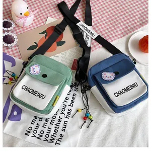Borsa a tracolla in tela da donna, simpatica borsa casual da giorno con tasca frontale pratica.