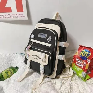 Casual colorblock backpack for women, stylish student school bag with large capacity pockets.