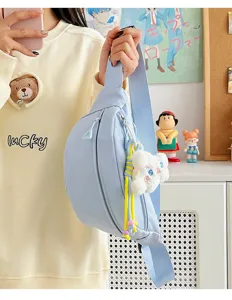 Korean style fashion solid color zipper waist bag with wide strap and cute plush pendant.