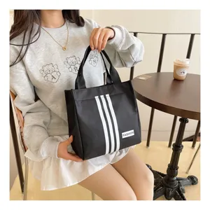 Bolso tote de almuerzo de lona negra con tres rayas blancas bolso de mano casual de moda para uso